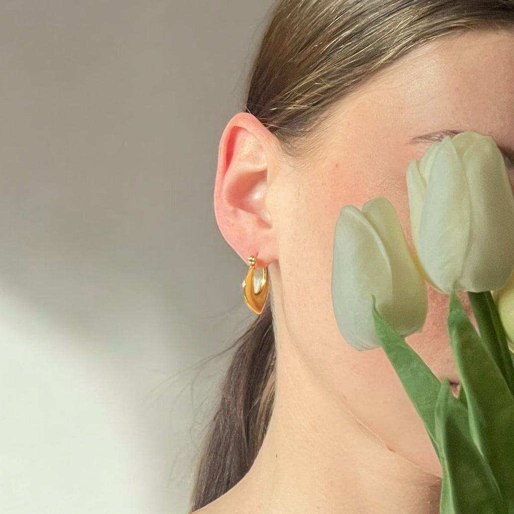 Boucles d'oreilles Détermination