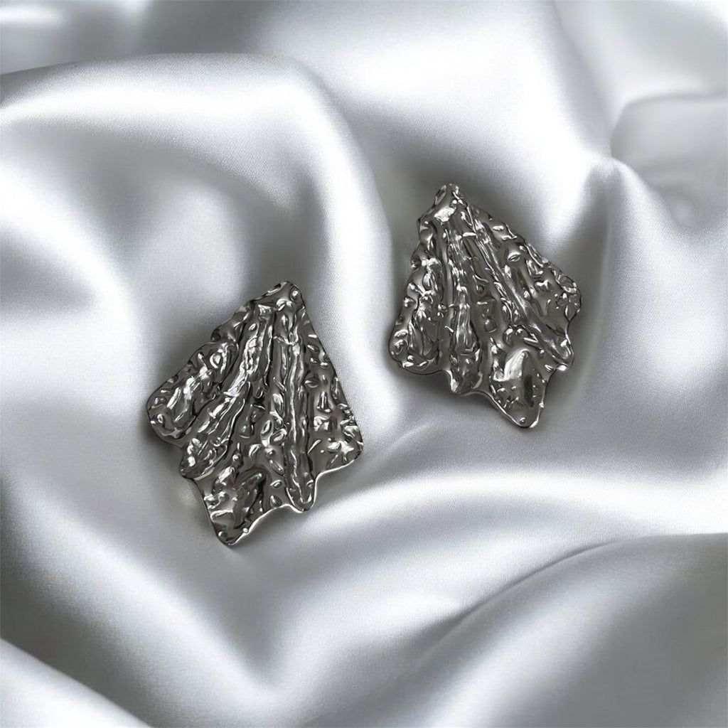 Boucles d'oreilles Mouvement